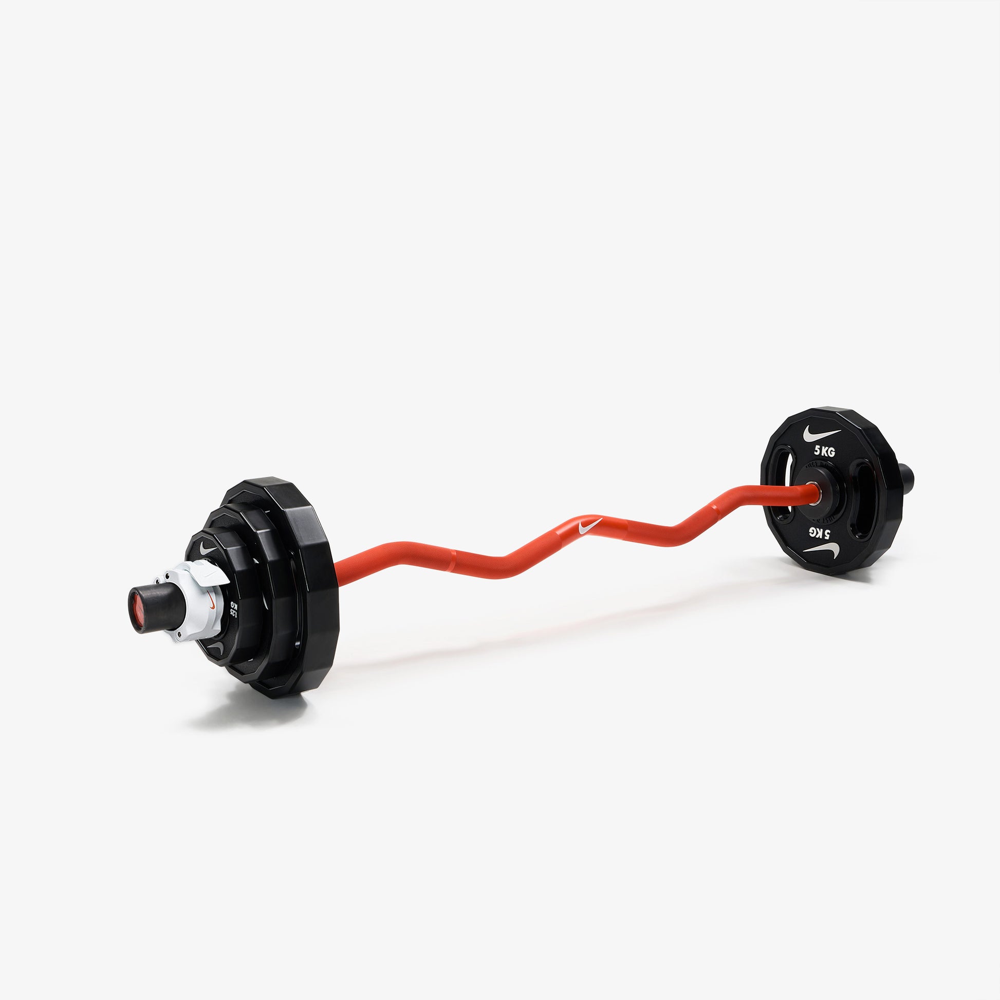 Nike Strength Shield Curl Bar - Orange SWOOSH / Nike Strength Pro Urethane Plates (1.25 - 5 kg pairs) / White/Orange