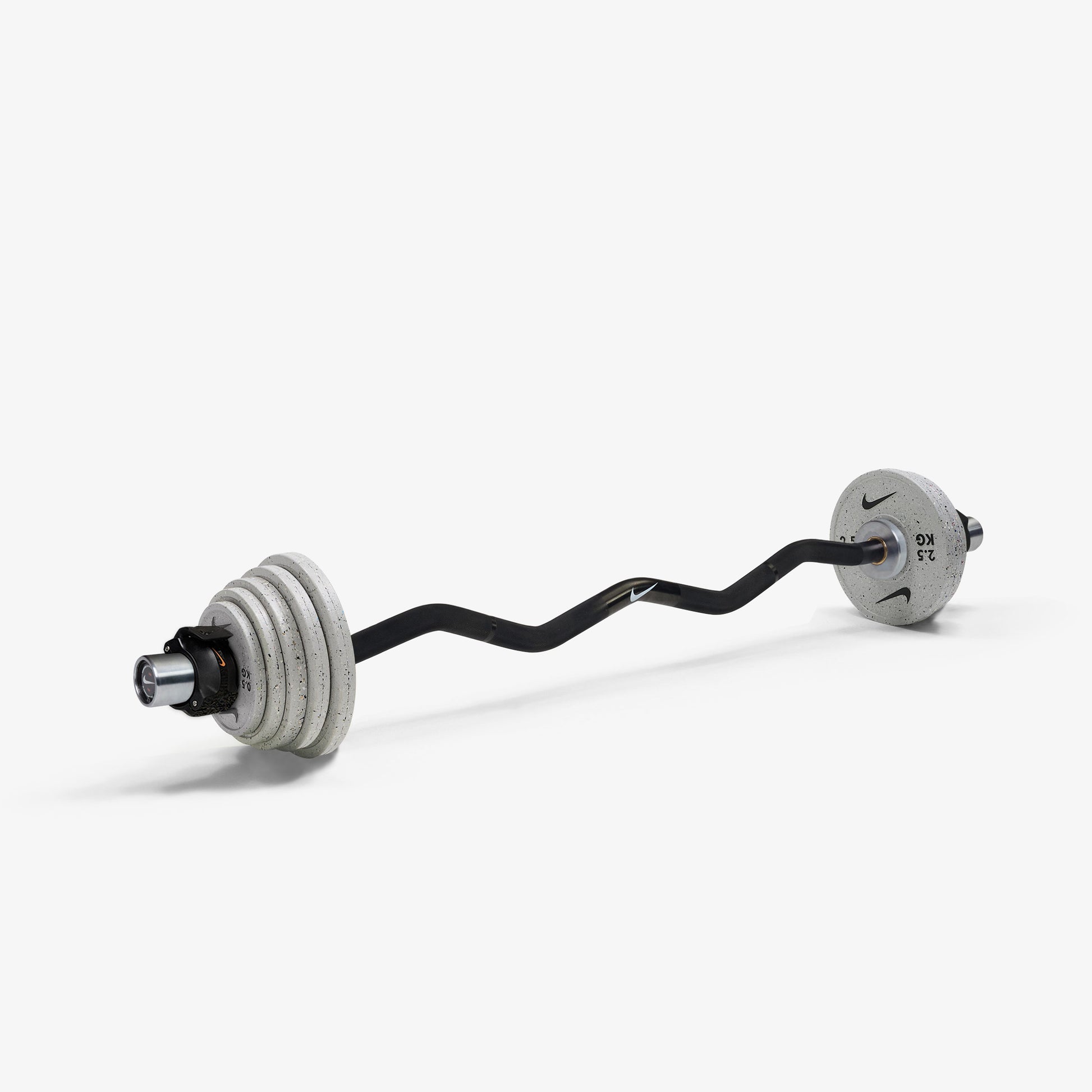 Nike Curl Bar - Black / Nike Grind Change Plates (0.5 - 2.5 kg pairs) / Black/Orange
