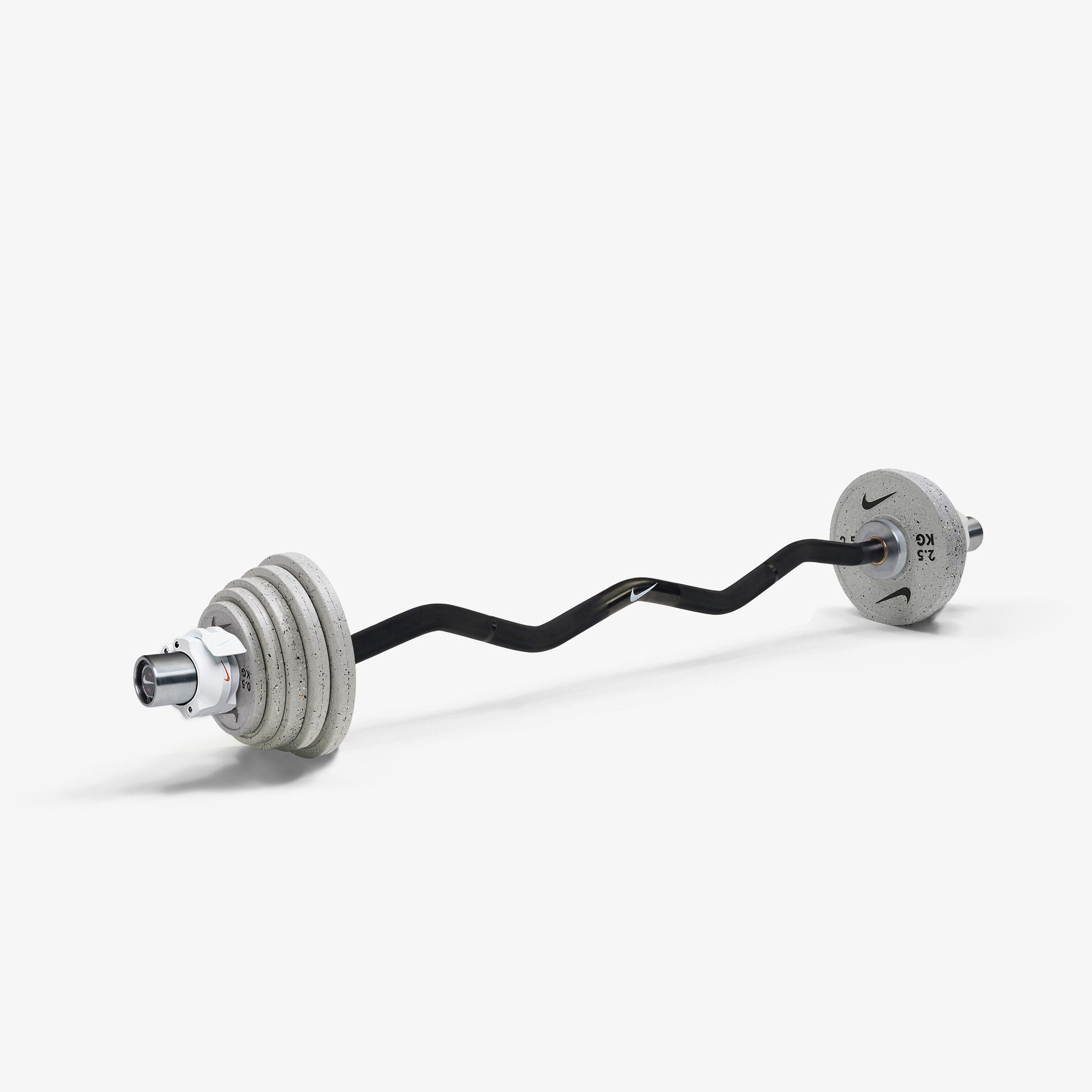 Nike Curl Bar - Black / Nike Grind Change Plates (0.5 - 2.5 kg pairs) / White/Orange