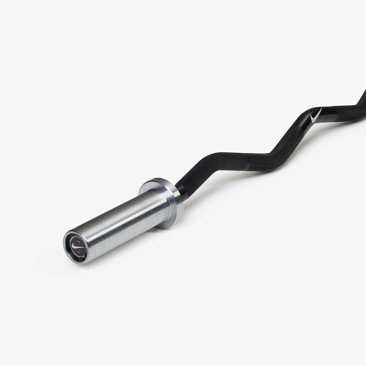 Nike Curl Bar - Black / Nike Change Plates (0.5 - 2.5 kg pairs) / White/Orange