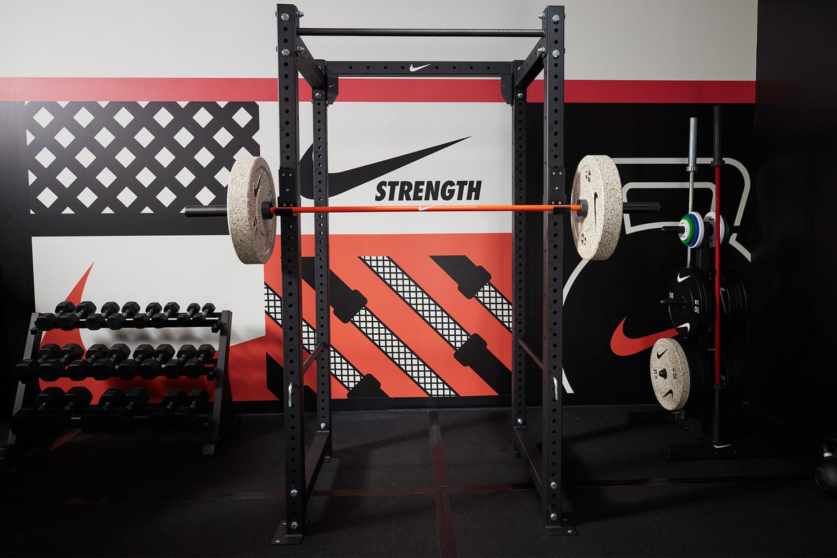 Nike squat cage with Nike coated premium barbell 15kg and Nike Rubber Bumper Plate (Grind)