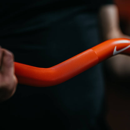 Nike Strength Shield Curl Bar - Orange SWOOSH / Nike Change Plates (0.5 - 2.5 kg pairs) / Black/Orange