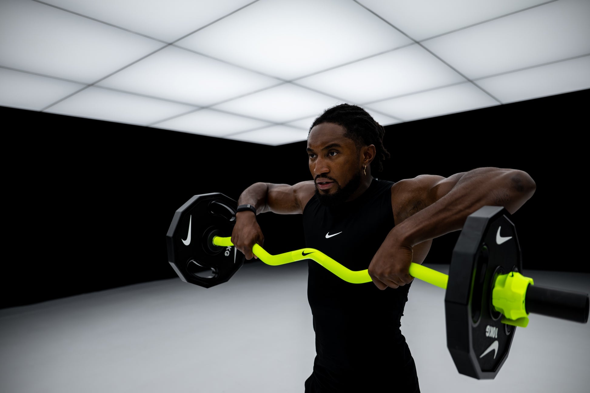 Nike Strength Shield Curl Bar - Volt Swoosh / Nike Change Plates (0.5 - 2.5 kg pairs) / White/Orange | Nike Strength Shield Curl Bar - Volt Swoosh / Nike Change Plates (0.5 - 2.5 kg pairs) / Black/Orange | Nike Strength Shield Curl Bar - Volt Swoosh / Nike Strength Pro Urethane Plates (1.25 - 5 kg pairs) / White/Orange | Nike Strength Shield Curl Bar - Volt Swoosh / Nike Strength Pro Urethane Plates (1.25 - 5 kg pairs) / Black/Orange